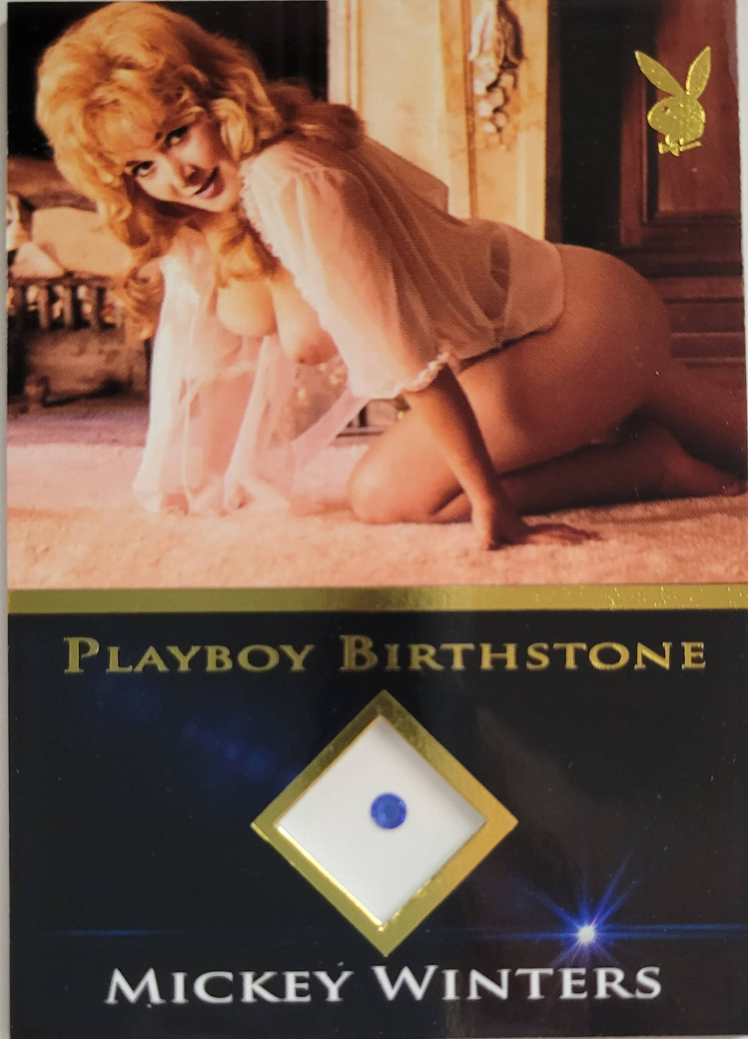 PLAYBOY'S SPOTLIGHT GOLD BIRTHSTONE MICKEY WINTERS