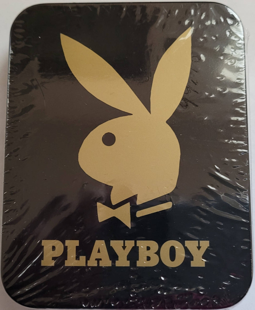 PLAYBOY'S SIGNATURE SERIES Each tin contains PLAYMATES over the past 50 years. INCLUDES 6 AUTOGRAPHED CARDS ONE RED FOIL stamped AUTOGRAPH CARD per tin numbered 1 to 75